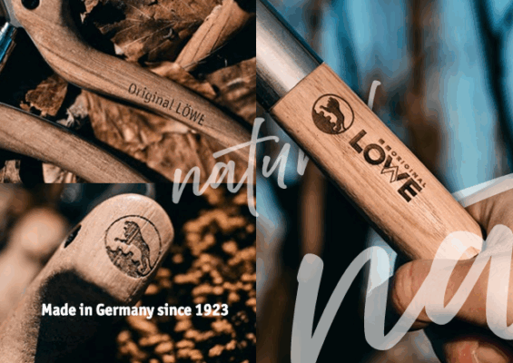 Takkenschaar met houten handvat